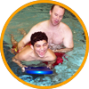 Special Recreation for Teachers Therapists and Professionals image of special recreation professional swimming with disabled teen