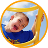 image of kid climbing playground equipment